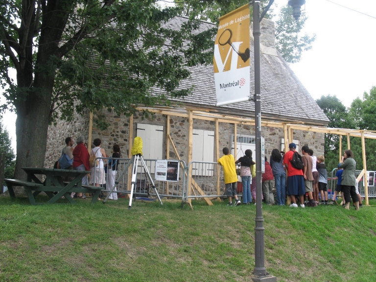 Groups of visitors at the archaeological dig site, August 2009 